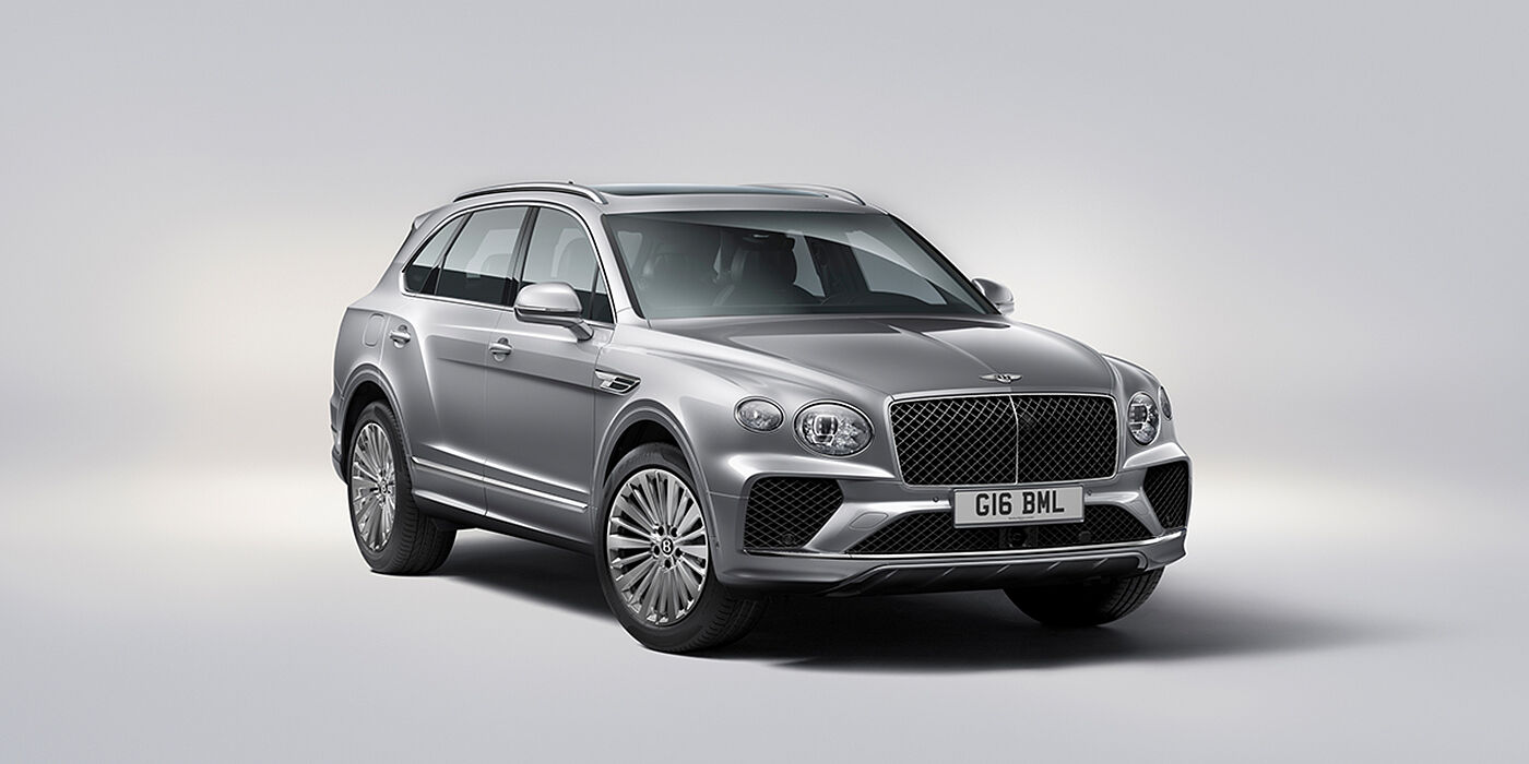 Bentley Istanbul Bentley Bentayga luxury SUV front three quarter view in Moonbeam paint with matrix grille and 21″ 5 spoke painted wheels