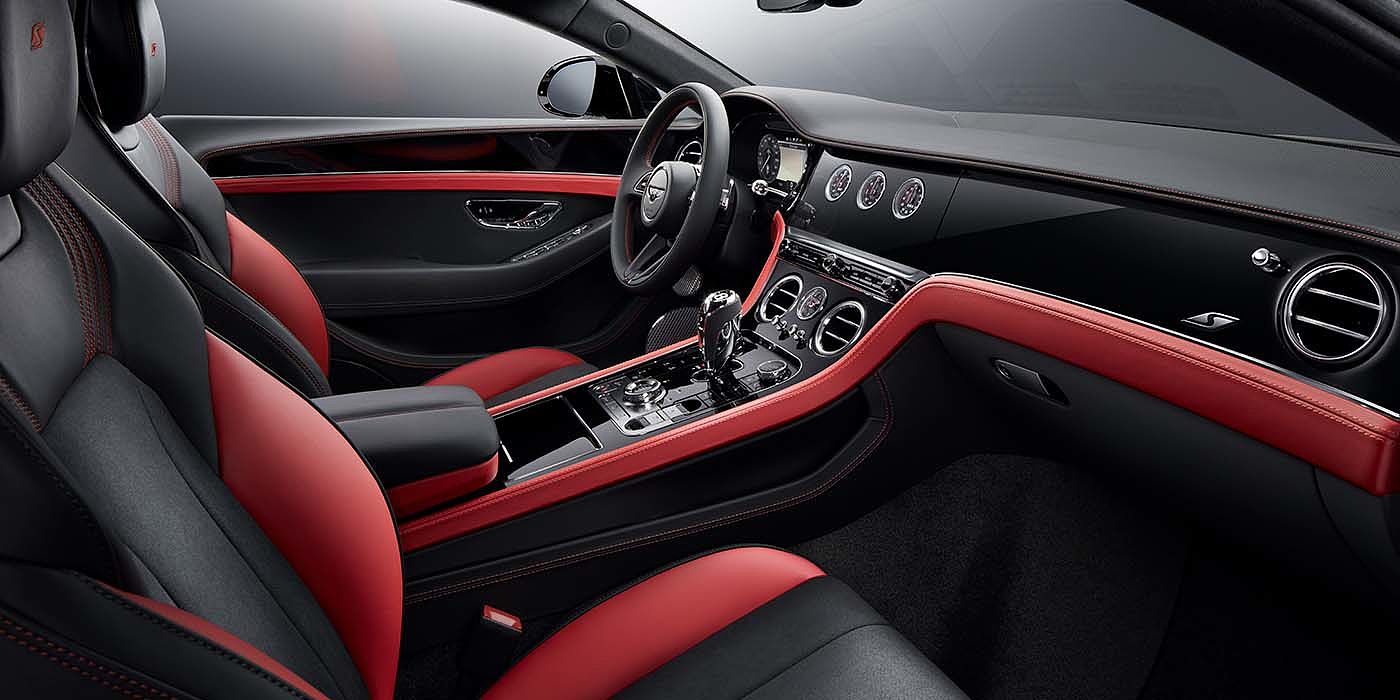 Bentley Istanbul Bentley Continental GT S coupe front interior in Beluga black and Hotspur red hide with high gloss Carbon Fibre veneer