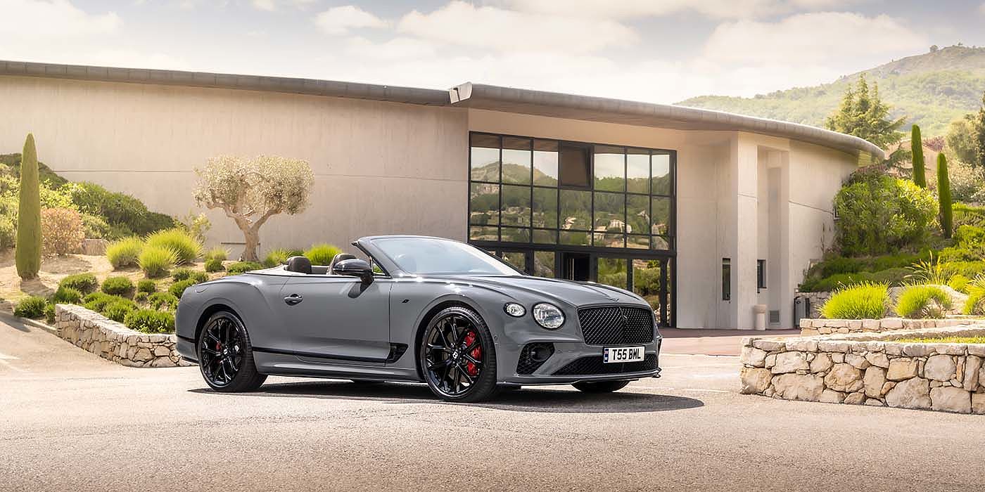 Bentley Istanbul Bentley Continental GTC S convertible in Cambrian Grey paint front 34 static near house