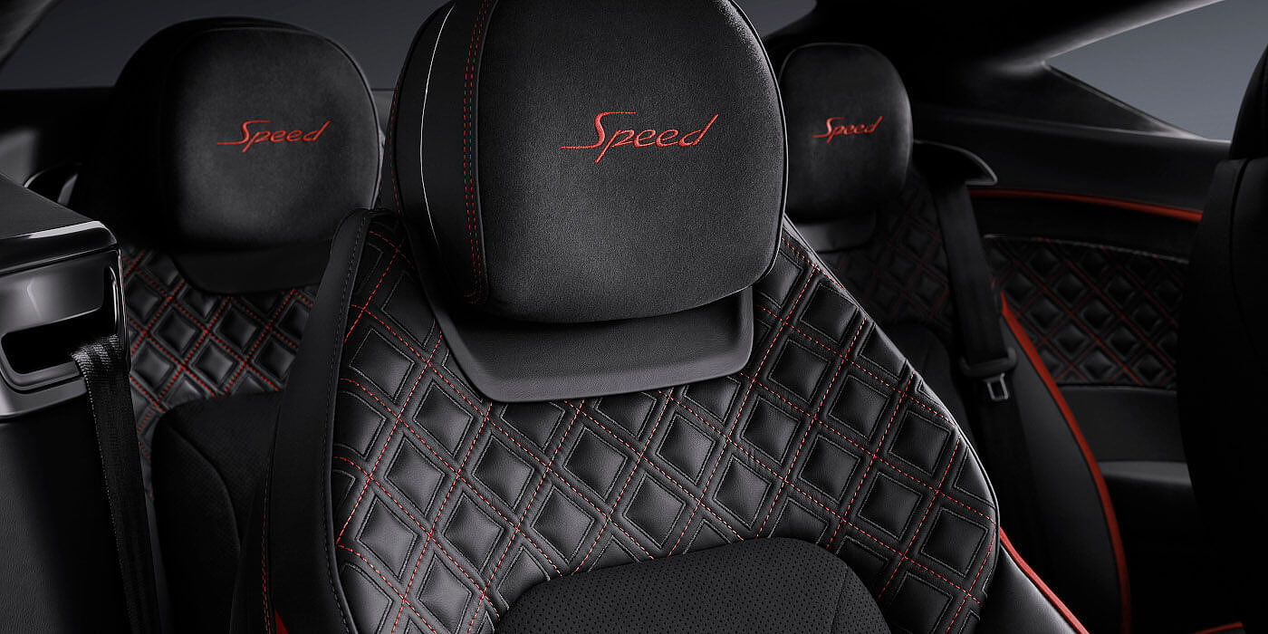 Bentley Istanbul Bentley Continental GT Speed coupe seat close up in Beluga black and Hotspur red hide
