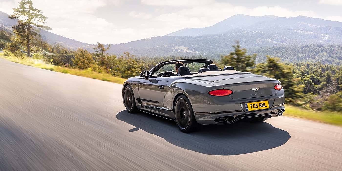 Bentley Istanbul Bentley Continental GTC S convertible in Cambrian Grey paint rear 34 dynamic driving