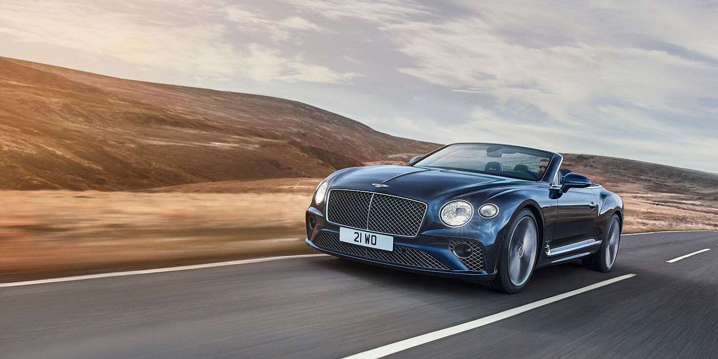 Bentley Istanbul Bentley Continental GTC Speed convertible in Peacock paint side front 34 dynamic