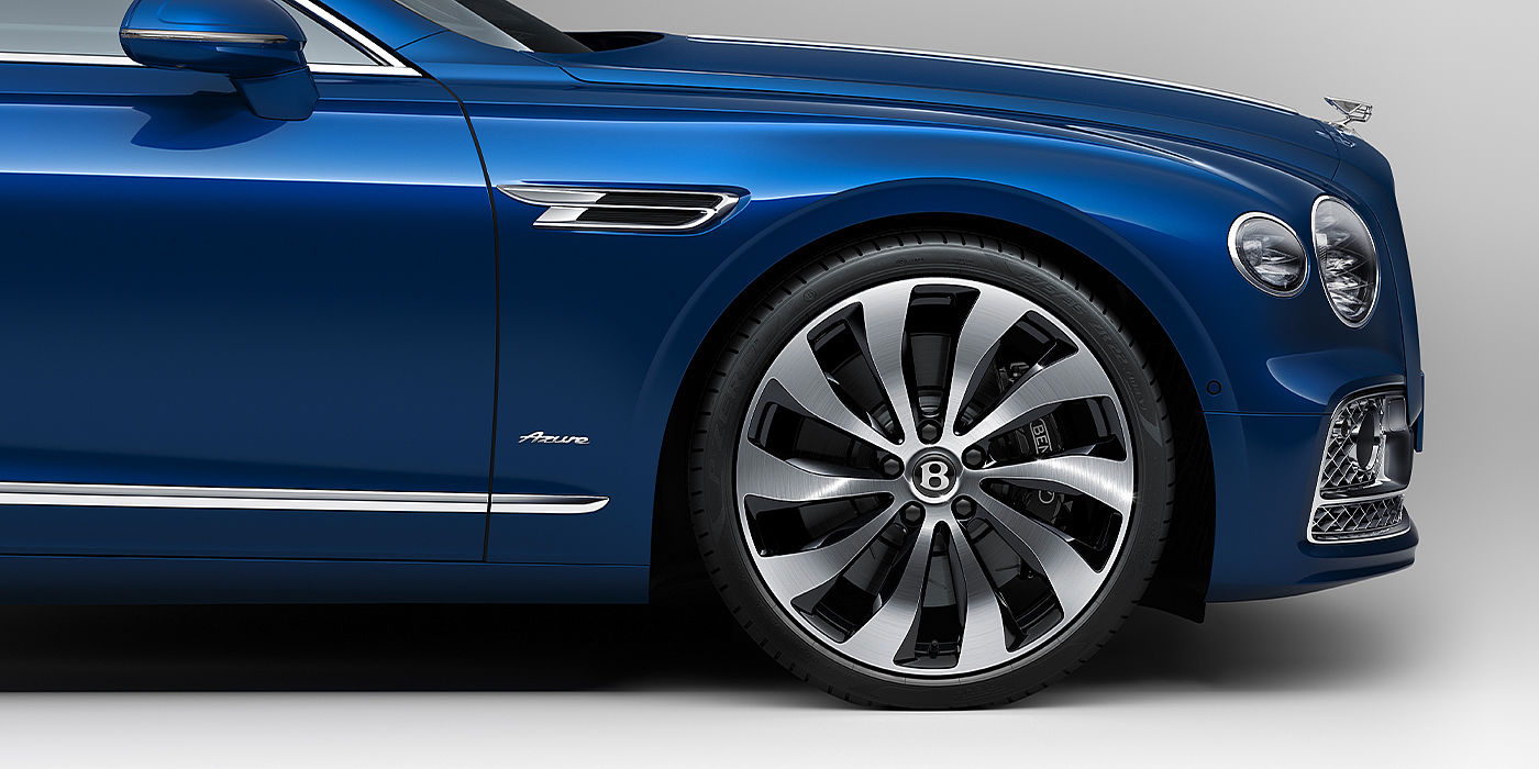 Bentley Istanbul Bentley Flying Spur Azure sedan side close up in Sequin Blue paint with Azure badge