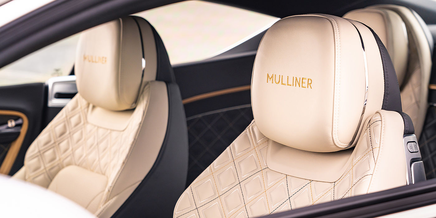 Bentley Istanbul Bentley Continental GT Mulliner coupe seat detail in Beluga black and Linen hide