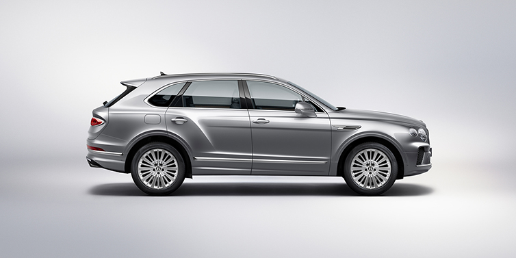 Bentley Istanbul Bentley Bentayga SUV side profile in Moonbeam silver paint against white background featuring 21 inch 5 spoke wheels